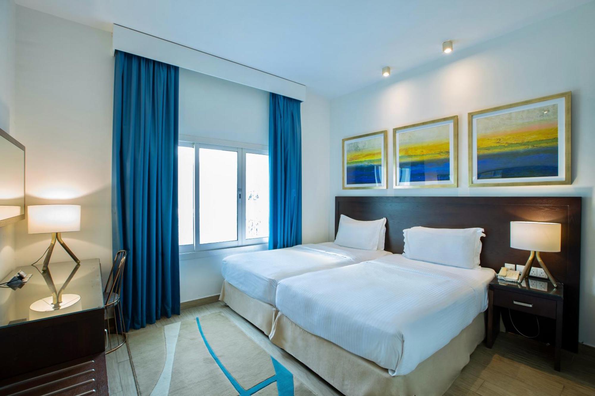 Radisson Blu Resort, Fujairah Exterior foto A bedroom at the hotel